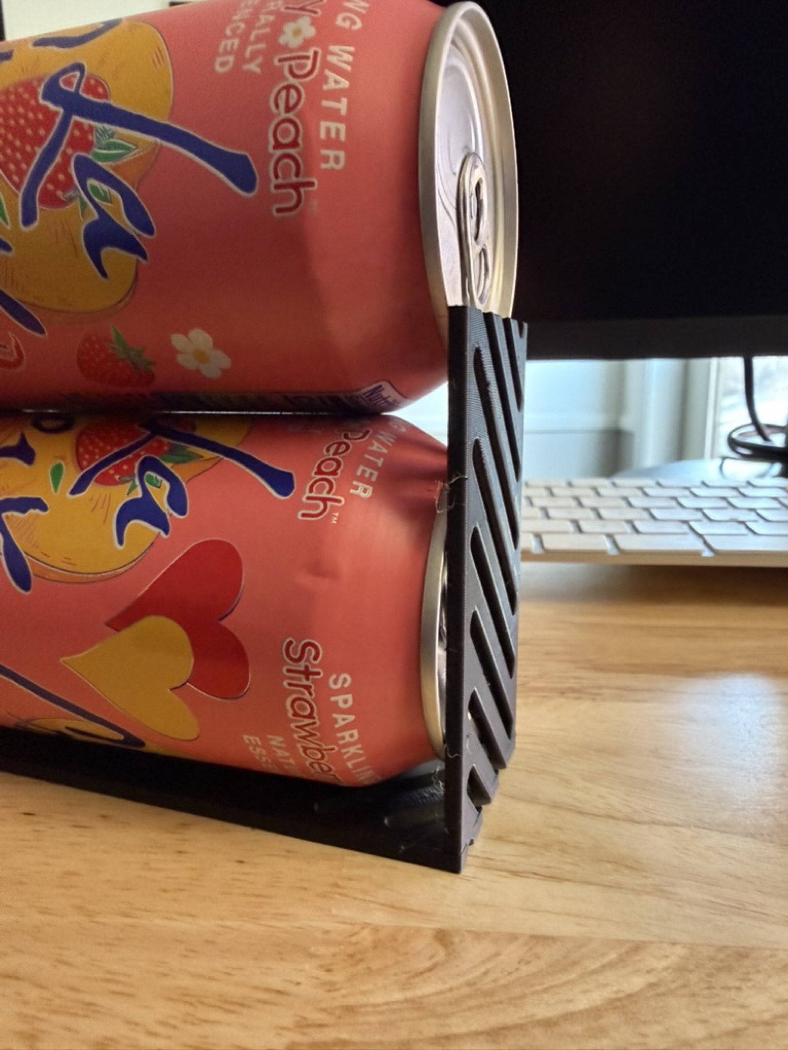 An earlier prototype loaded with two cans during real-world testing